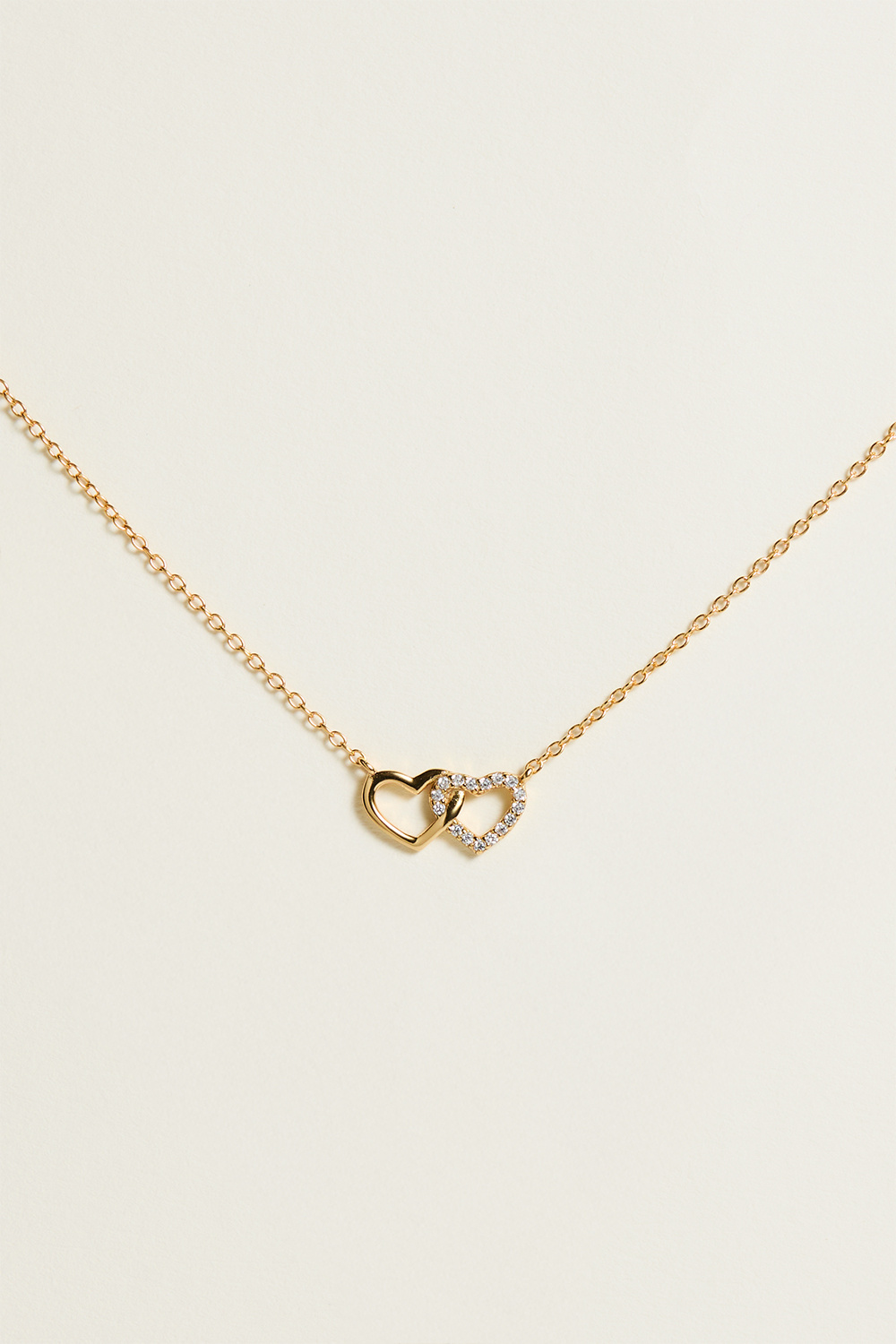 Halskæde forgyldt med 18 karat guld med to hjerter