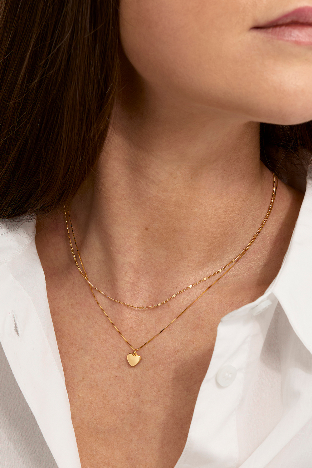 Halskæde i 18k forgyldt ægte sølv med små hjerter